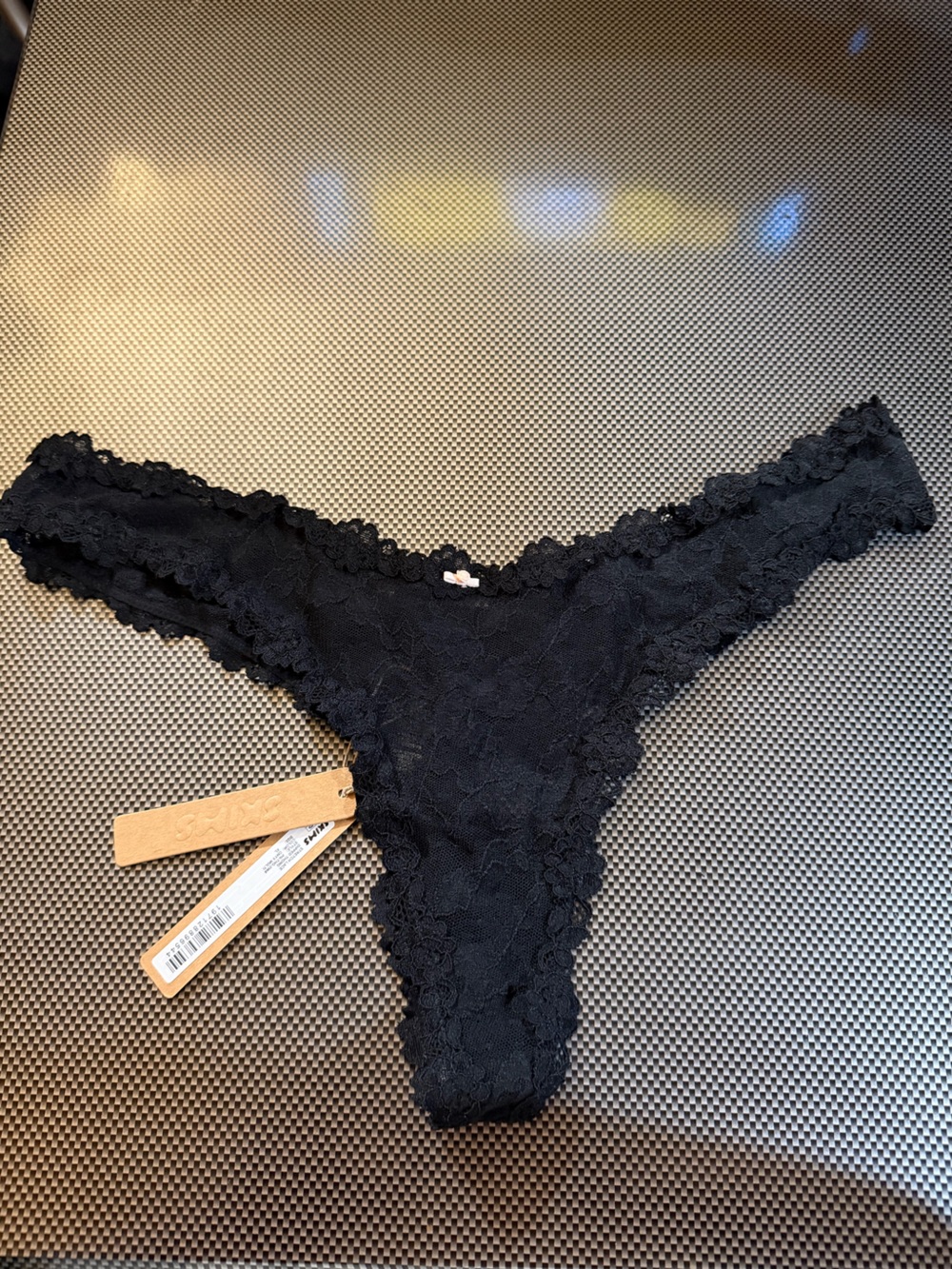 NWT skims stretch lace dipped thong in black size XL